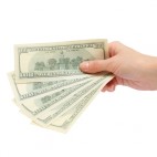 How to Retain Customers | Hand with Dollar Bills
