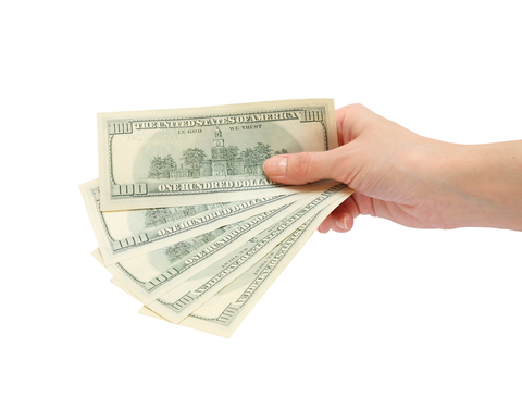 How to Retain Customers | Hand with Dollar Bills